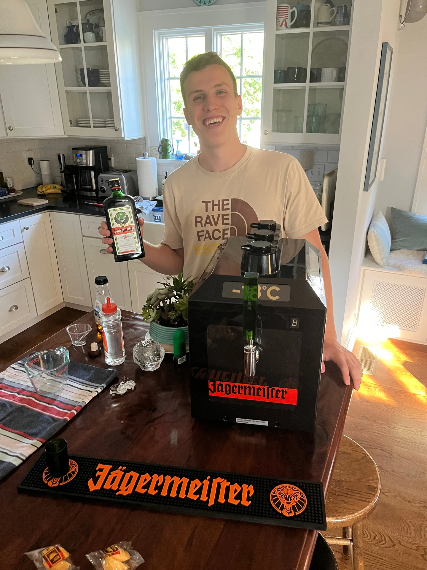 Paul with a bottle of Jägermeister and the tap machine